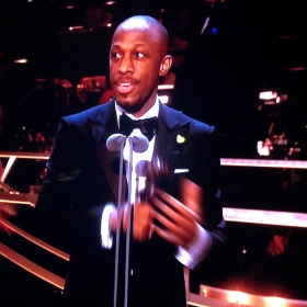 Giles Terera collects Best Actor in a Musical for Hamilton
