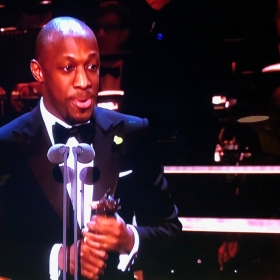 Giles Terera collects Best Actor in a Musical for Hamilton