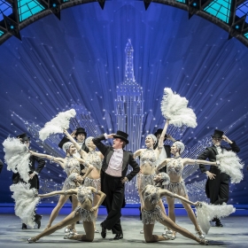 Haydn Oakley & cast in An American in Paris at London's Dominion Theatre. © Johan Persson